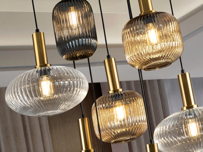 Lámpara de techo NORMA-LAMP 9L en negro y latón de Schuller, con 9 luces, diseño moderno e industrial sofisticado, regulable en altura, para comedor o salón.