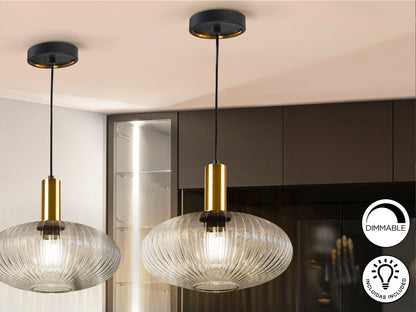 Lámpara de techo Norma en negro y latón de Schuller 225410, diseño moderno industrial con 1 luz E27, cristal transparente y altura regulable, ideal para comedor o salón.