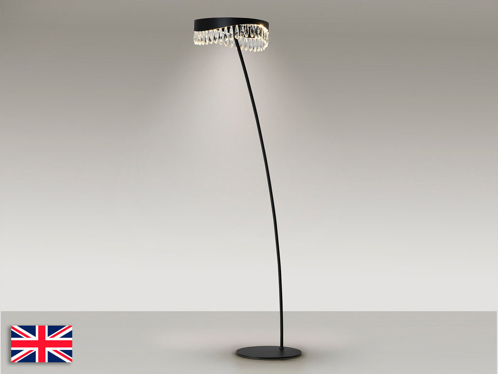 Lámpara de pie Selene negro mate Schuller, con cristal facetado, iluminación LED y diseño moderno para salón.