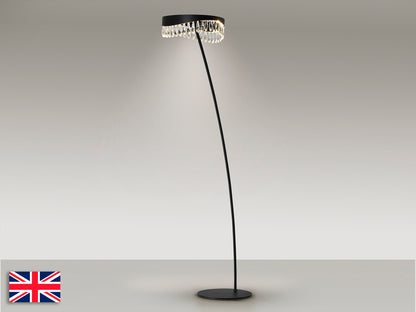 Lámpara de pie Selene negro mate Schuller, con cristal facetado, iluminación LED y diseño moderno para salón.