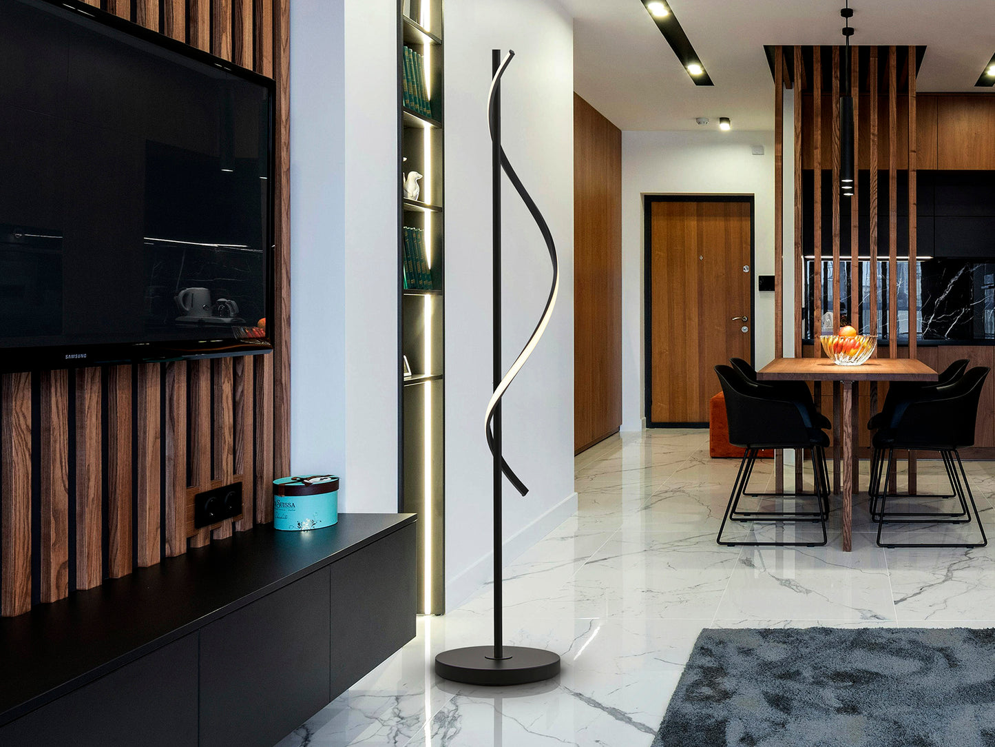 Lámpara de pie Boa negra de metal con diseño moderno y LED integrado, ideal para salón y estudio. Colección Schuller, acabado negro mate.