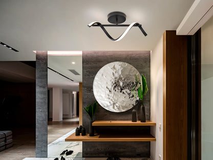 Aplique Boa Negro de aluminio con luz LED, diseño minimalista y moderno para techo, marca Schuller.