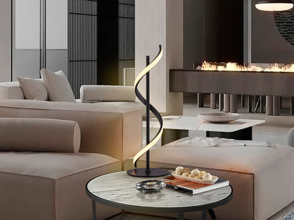 Lámpara de sobremesa BOA negra de metal para dormitorio o salón, diseño moderno y minimalista con tecnología LED, marca Schuller.