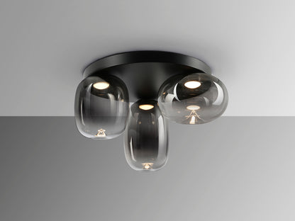 Plafón de techo Onice 3 luces negro y gris smoke, diseño moderno e industrial con LED integrado. Fabricado en metal y cristal, ideal para iluminación elegante. Producto Schuller.