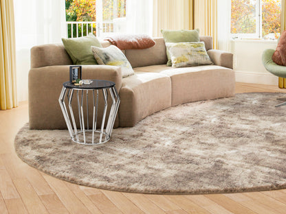 Mesa velador Ciros de acero brillo Schuller en dormitorio moderno, con cristal smoke y diseño minimalista. Ideal como mesa auxiliar en salón.