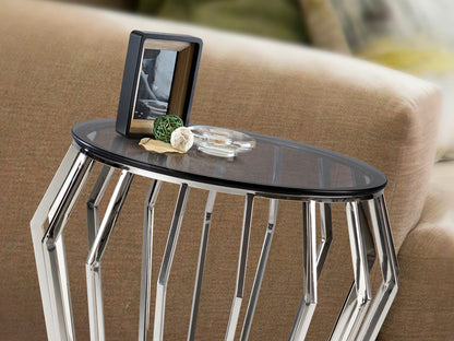 Mesa velador Ciros de acero brillo con tapa de cristal smoke, ideal como mesa auxiliar moderna y minimalista para dormitorio o salón. Producto Schuller, modelo 336710.