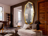 Espejo LONDON Oro brillo dorado de acero y cristal, ideal para recibidor o salón moderno y glam con diseño de Schuller.