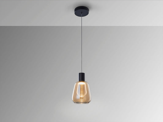 Lámpara colgante Carisa negro y ámbar de Schuller (341017) iluminando un comedor moderno, con diseño en cristal y metal, tecnología LED, regulable en altura, ideal para salón.