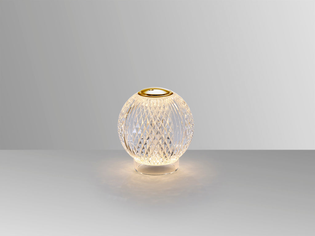 Lámpara de sobremesa Austral 1L oro transparente Schuller, diseño moderno y glam con tecnología LED, ideal para salón.