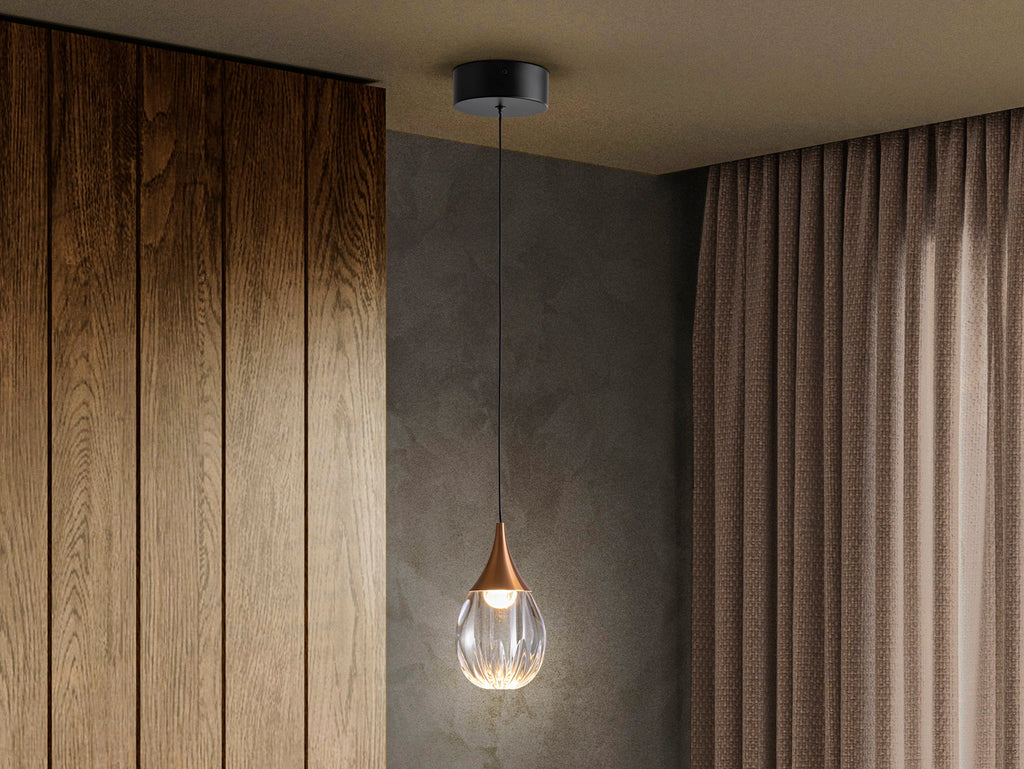 Lámpara colgante Corina negro cobre de Schuller en comedor moderno. Diseño industrial con detalles en metal, acrílico transparente y estilo nórdico para salón. Modelo 403467.