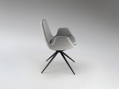 Silla giratoria Zuna gris claro Schuller, diseño moderno con estructura de metal negro mate y tapizado textil, ideal para comedor y oficina.