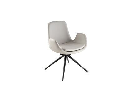 Silla giratoria Zuna blanco hueso Schuller en oficina moderna con detalles negros y estilo industrial. Ideal para despacho.