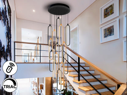 Lámpara de techo Colette 14L negro y oro rosa de Schuller, ideal para comedor y salón. Diseño moderno e industrial chic con LED, regulable en altura y dimmable. Fabricada en aluminio, silicona y opal.