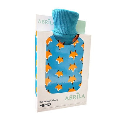 Bolsa de agua caliente fabricada en caucho color azul con funda textil