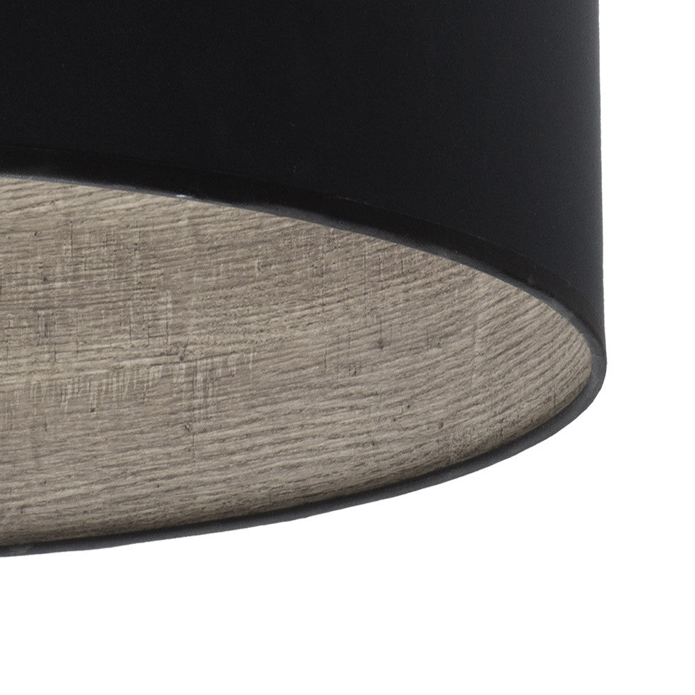 Lámpara colgante fabricada en metal negro y textil con detalles de madera gris, color principal negro