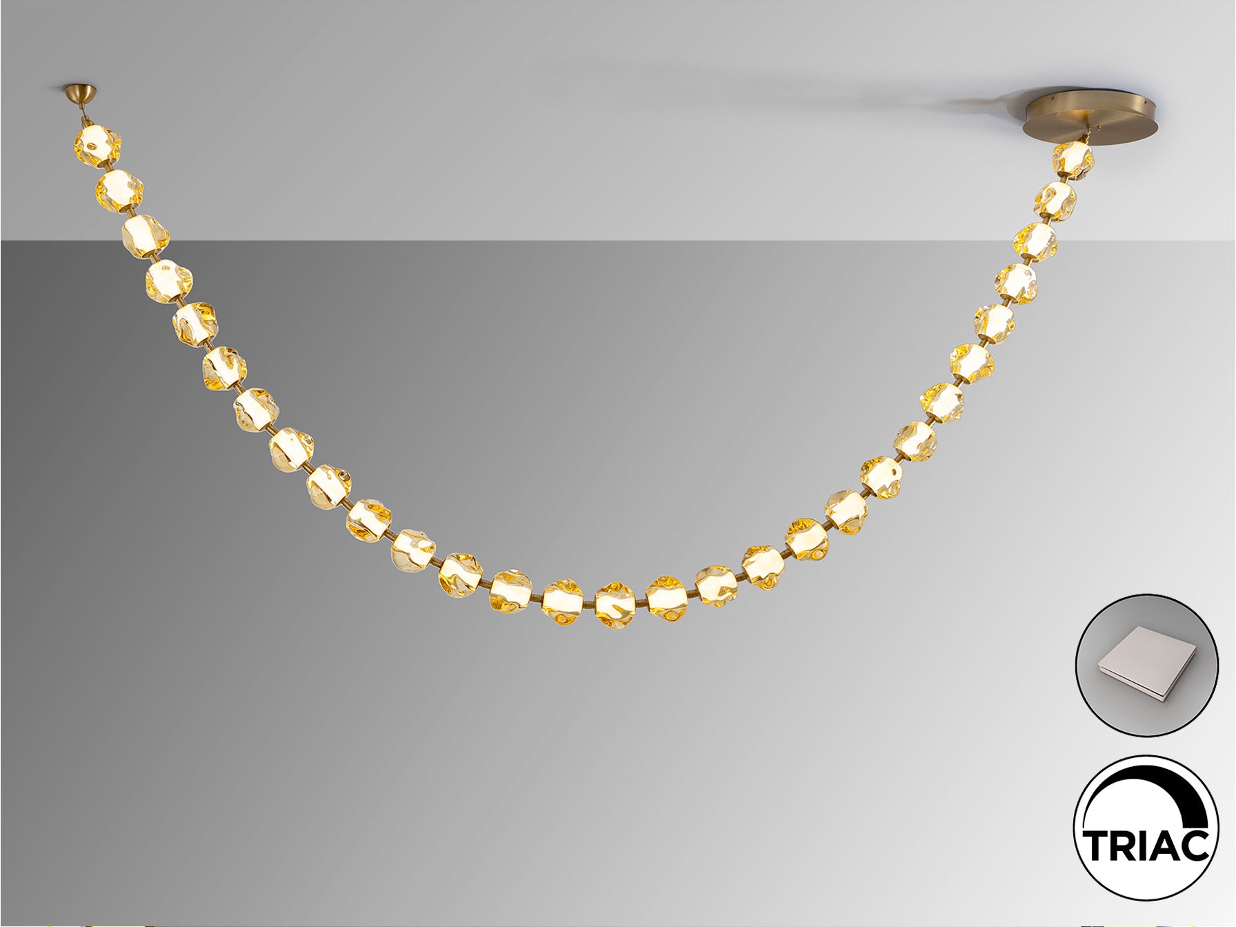 Lámpara Zaria II de Schuller - Detalle de la elegante lámpara colgante de metal bronce con 29 tulipas de acrílico ámbar (Ref. 448956). Iluminación LED 105W, 8210 lúmenes, 3000K.  LUZGURÚ.
