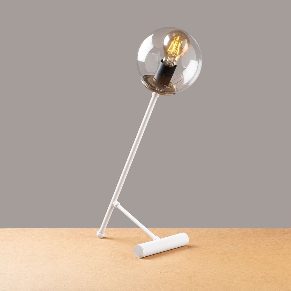 Lámpara de mesa fabricada en metal y cristal, color blanco mate.
