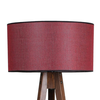 Lámpara de pie fabricada en madera color burdeos con mesa auxiliar