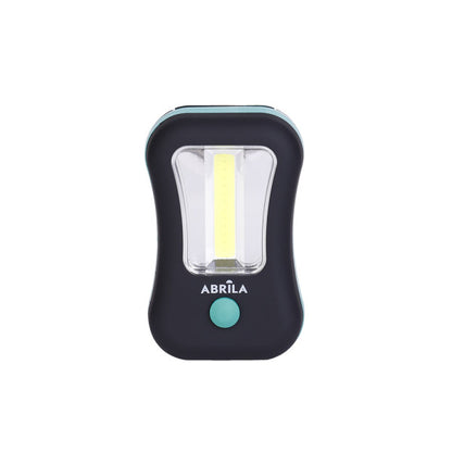 Linterna LED COB Flash Compacta 200 Lúmenes Negro/Verde Fabrilamp instalada en ambiente decorativo de salón o dormitorio | Fabrilamp / Abrila
