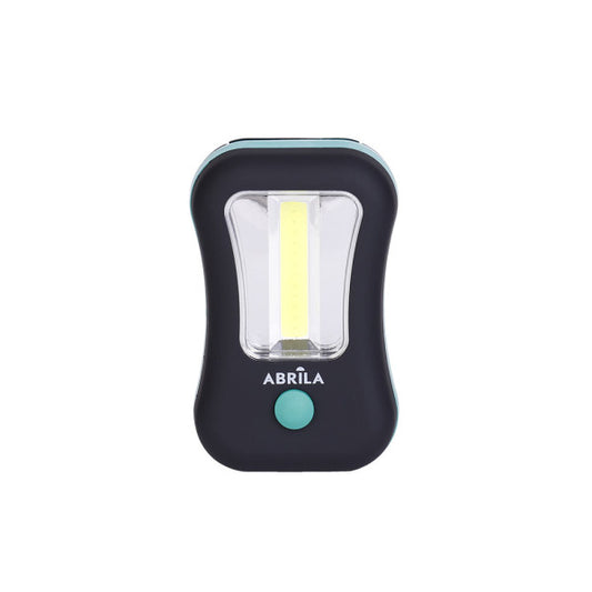 Linterna LED COB Flash Compacta 200 Lúmenes Negro/Verde Fabrilamp instalada en ambiente decorativo de salón o dormitorio | Fabrilamp / Abrila