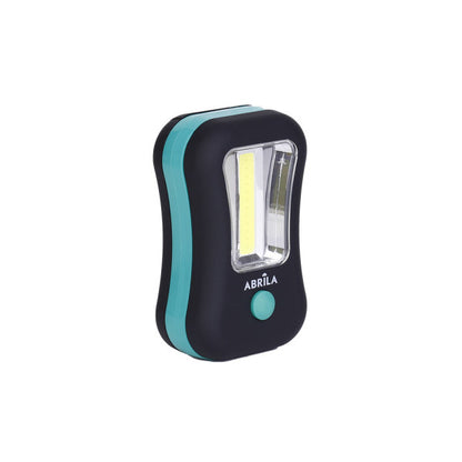 Linterna LED COB Flash Compacta 200 Lúmenes Negro/Verde Fabrilamp encendida con proyección de luz y ambiente | LuzGurú