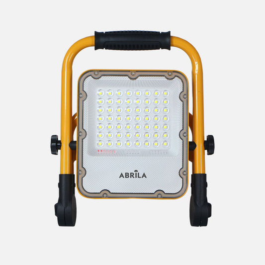 Proyector LED Inalámbrico Brion 30W Amarillo Fabrilamp instalada en ambiente decorativo de salón o dormitorio | Fabrilamp / Abrila