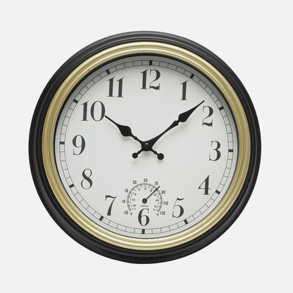 Elegante reloj vintage negro y dorado ideal para el salón
