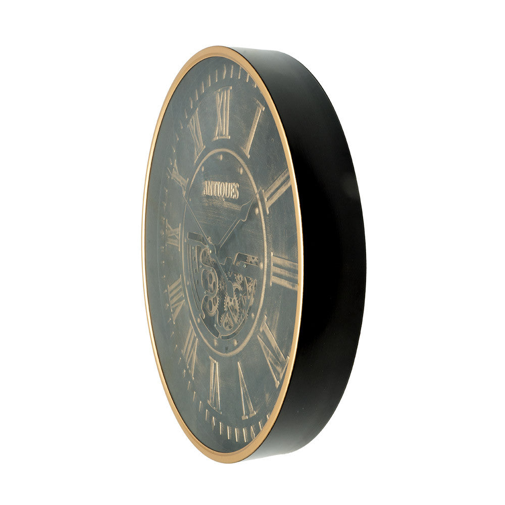 Reloj Trieste fabricado en metal color negro y oro