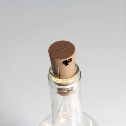 Tapón LED fabricado en plástico color verde para botellas
