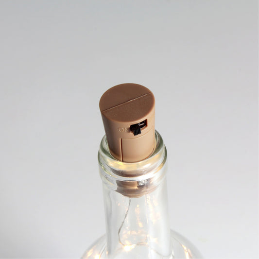 Tapón LED fabricado en plástico color verde para botellas