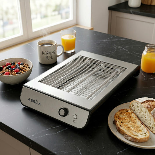 Tostador Horizontal Serpis 900 W Negro/Cromo Fabrilamp instalada en ambiente decorativo de salón o dormitorio | Fabrilamp / Abrila