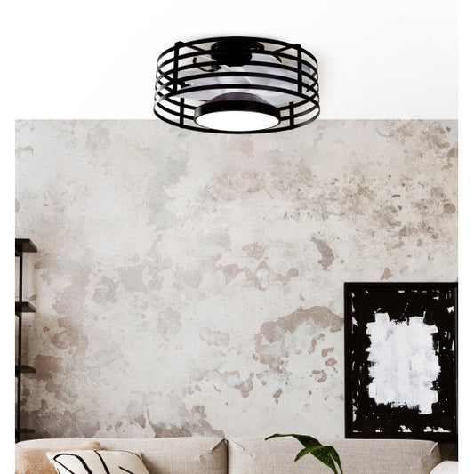Ventilador de Techo con Luz LED Xaloc 57,8 cm Negro y Aspas Blancas Fabrilamp instalada en ambiente decorativo de salón o dormitorio | Fabrilamp / Abrila